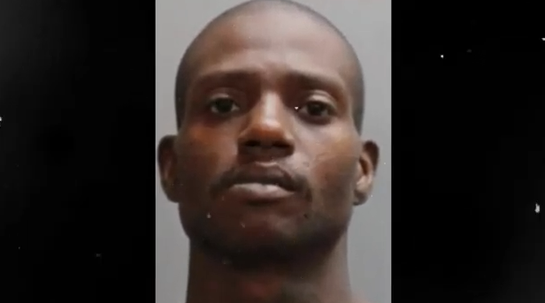 Mugshot of man who left girlfriend's body in a brown tarp